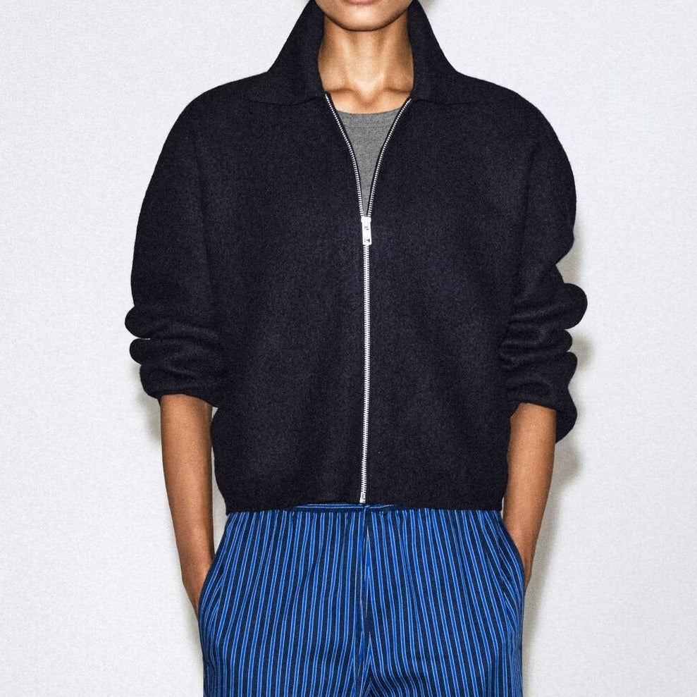 Navy blue collared zip up jacket