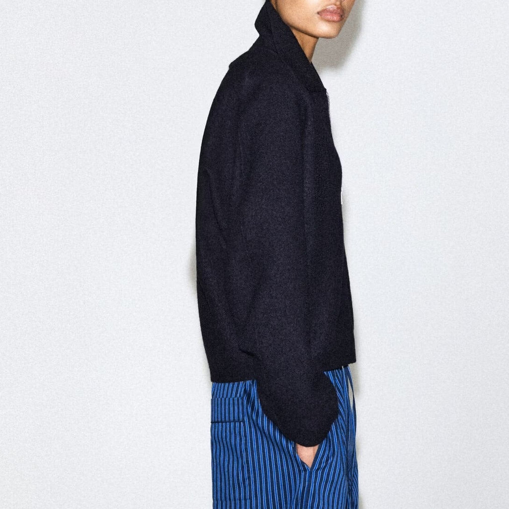 Navy blue collared zip up jacket